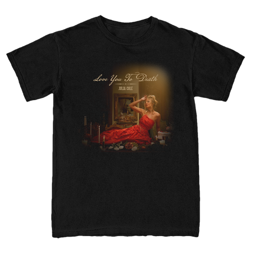 A black short-sleeve crewneck t-shirt featuring a graphic print of a Julia in a red dress sitting in a dark room with candles, with the text 'Love You To Death'